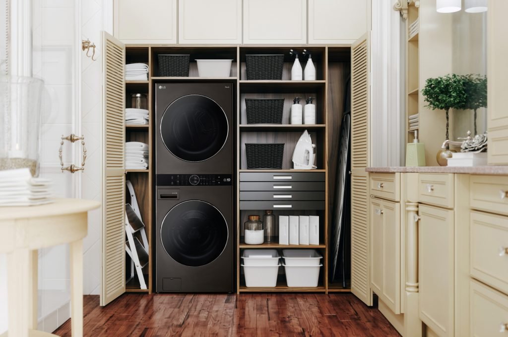 Washing machine and dryer in a luxury bathroom.